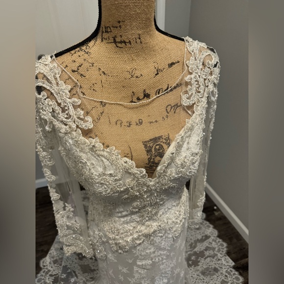 Beautiful brand new with tags Jasmine Couture wedding dress. Size 12. - Picture 10 of 10